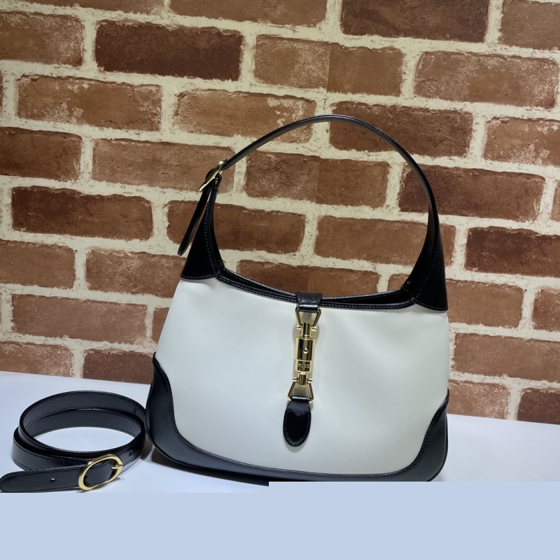 G*u*i top handle bags